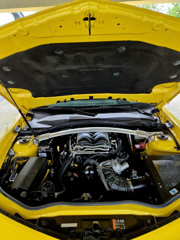 Engine detail showing clean components after steam wash