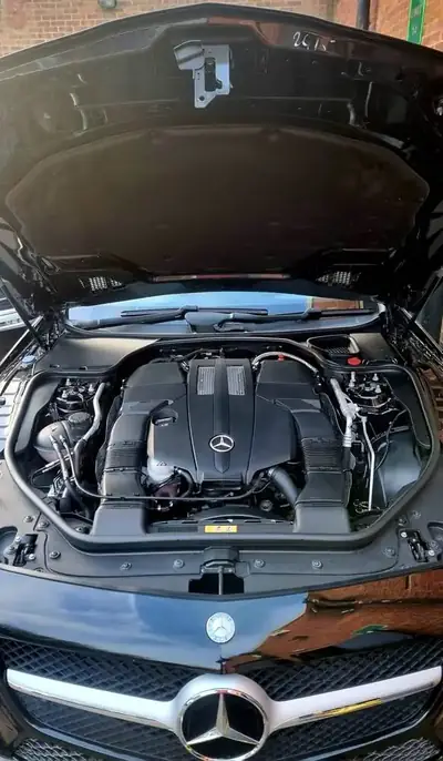 Factory-fresh engine bay finish after mobile steam clean